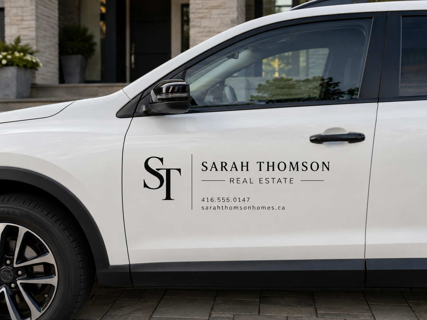 Sarah Thomson Real Estate vehicle door decal