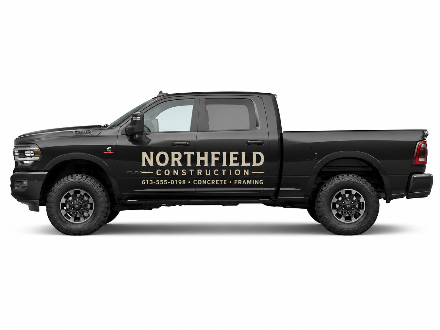 Black contractor pickup truck with sample Northfield Construction vinyl lettering
