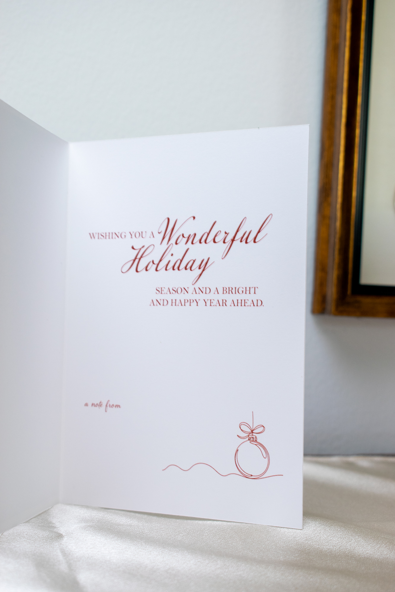 Holiday card interior with a warm handwritten seasonal message