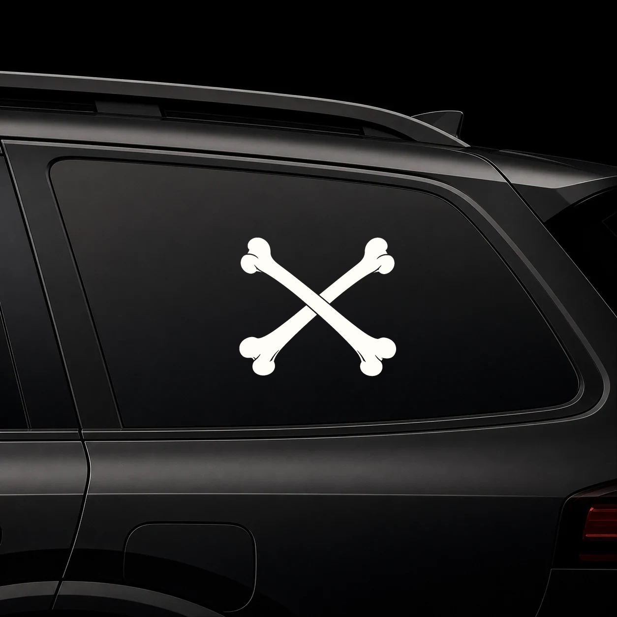 Crossed bones decal on a dark vehicle window