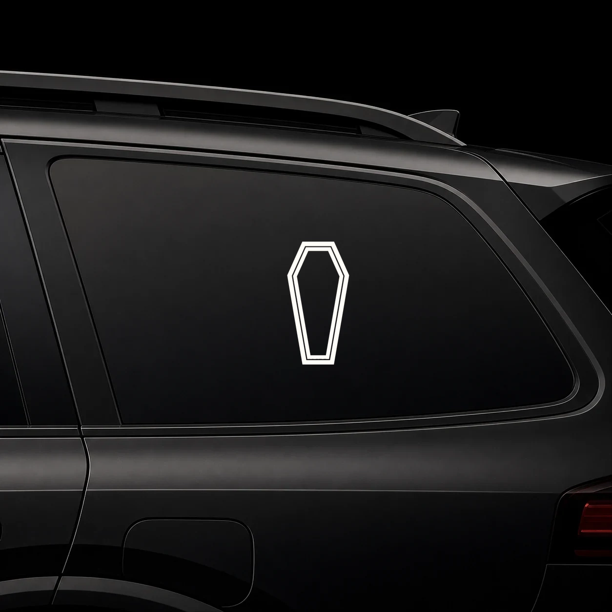 Coffin decal on a dark vehicle window
