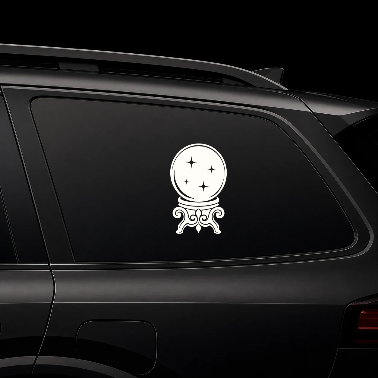 Crystal ball decal on a dark vehicle window