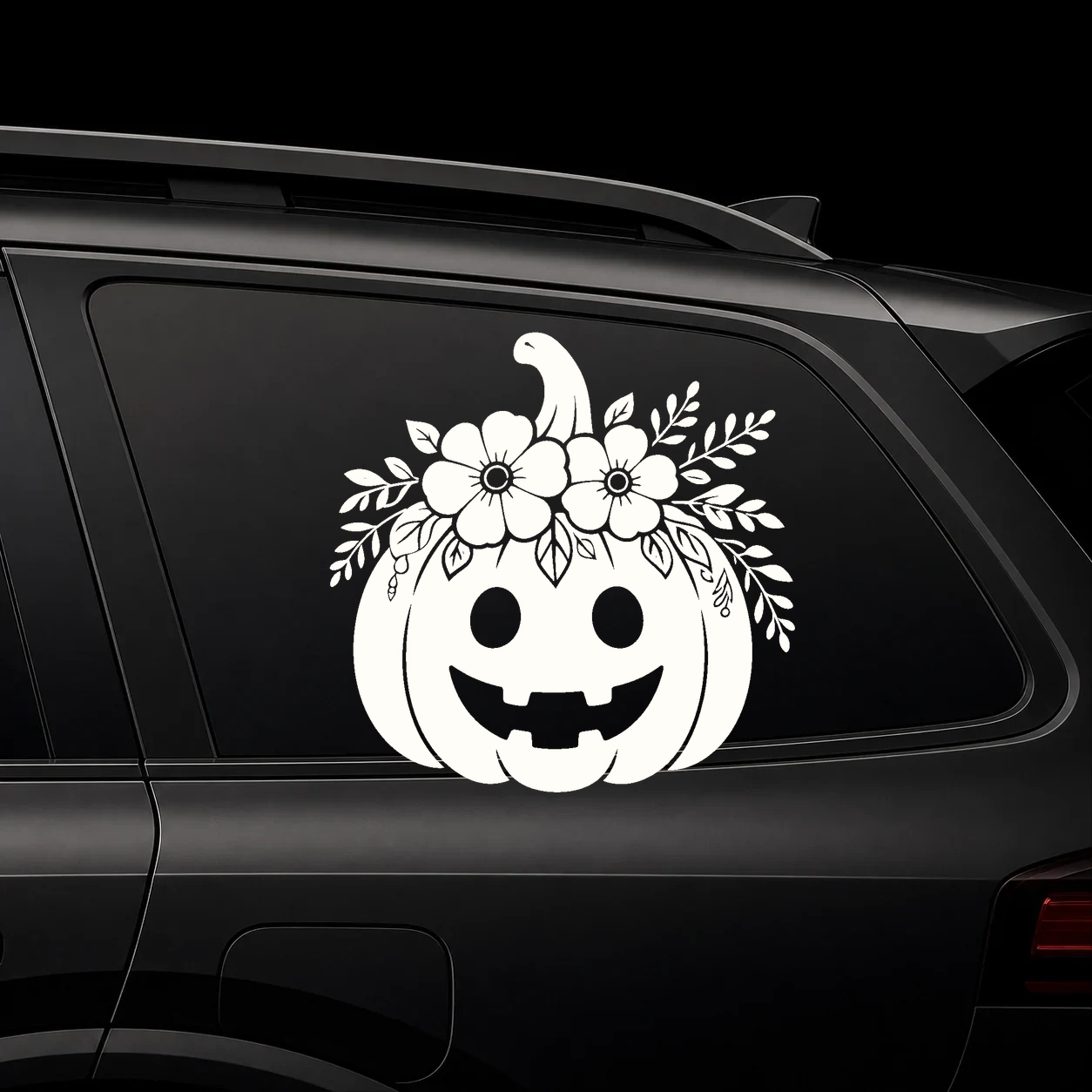 Warm ivory floral pumpkin decal on a black background