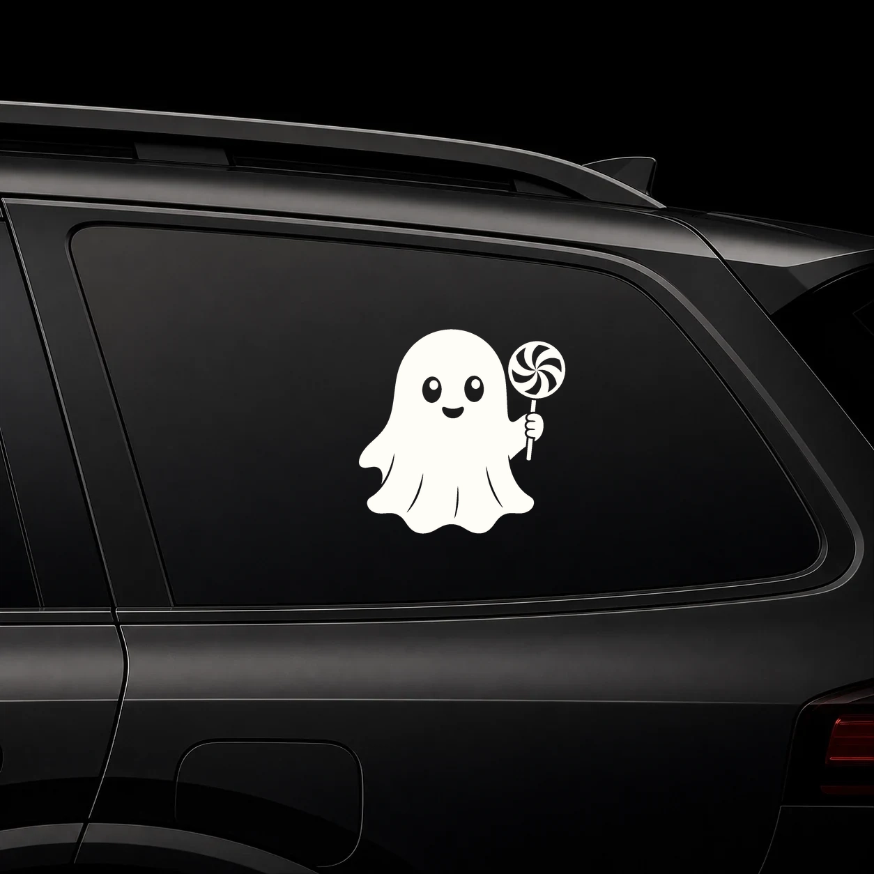 Cute ghost holding a lollipop decal on a dark vehicle window