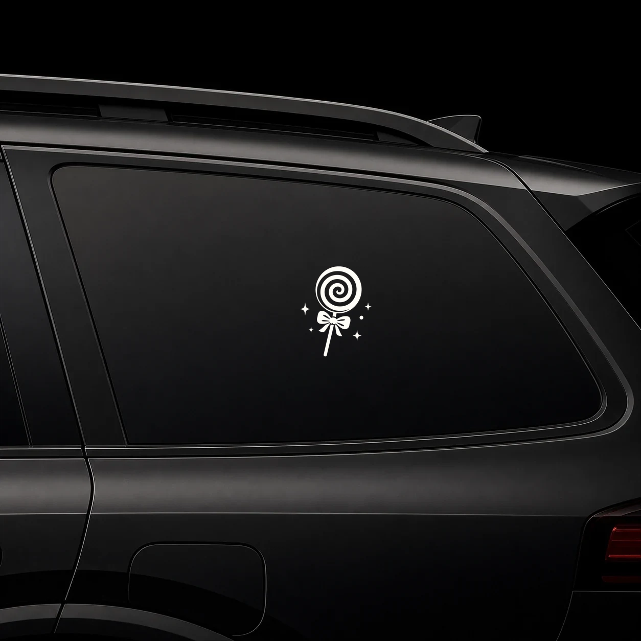 Swirled lollipop decal on a dark vehicle window
