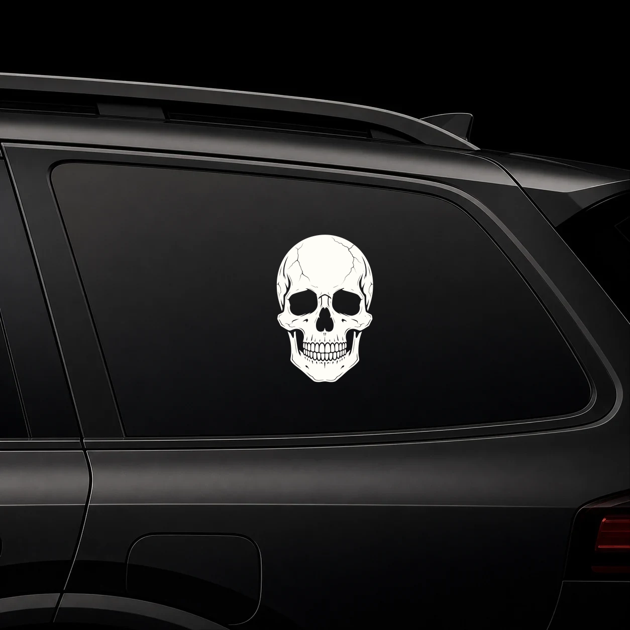 Classic skull decal on a dark vehicle window