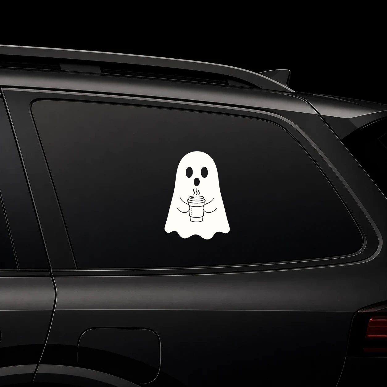 Cute coffee ghost decal on a dark vehicle window