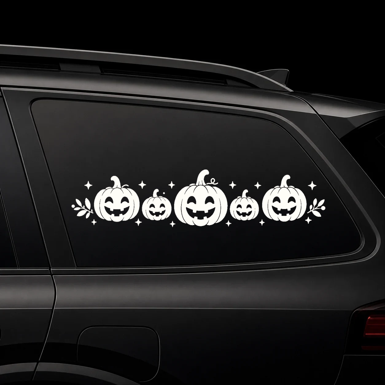Warm ivory tiny pumpkin border decal on a black background