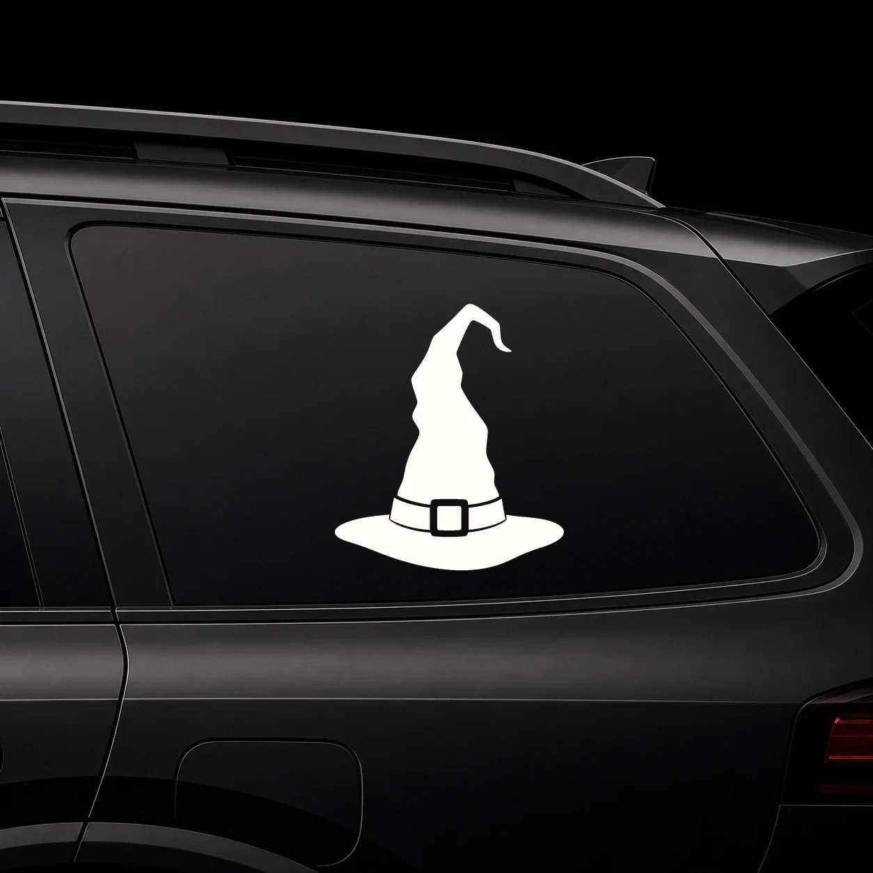 witch hat decal on a dark vehicle window