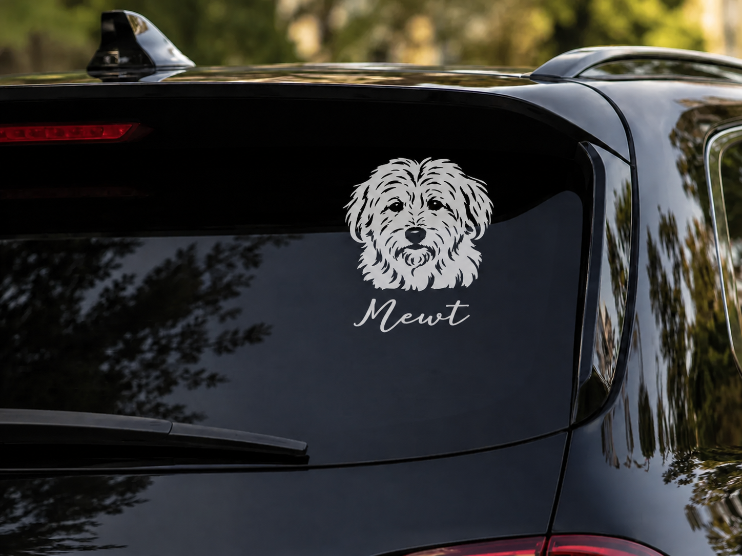 Newt’s finished decal on a vehicle rear window