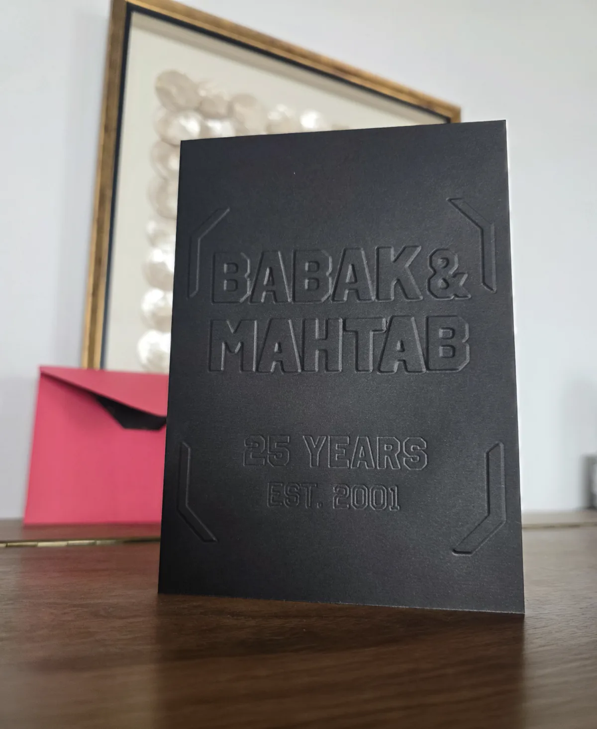 Black handcrafted anniversary card with custom blind embossing