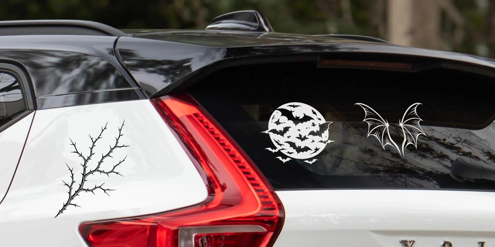 Gothic bat wings, moon with bats, and thorn branches installed on a vehicle