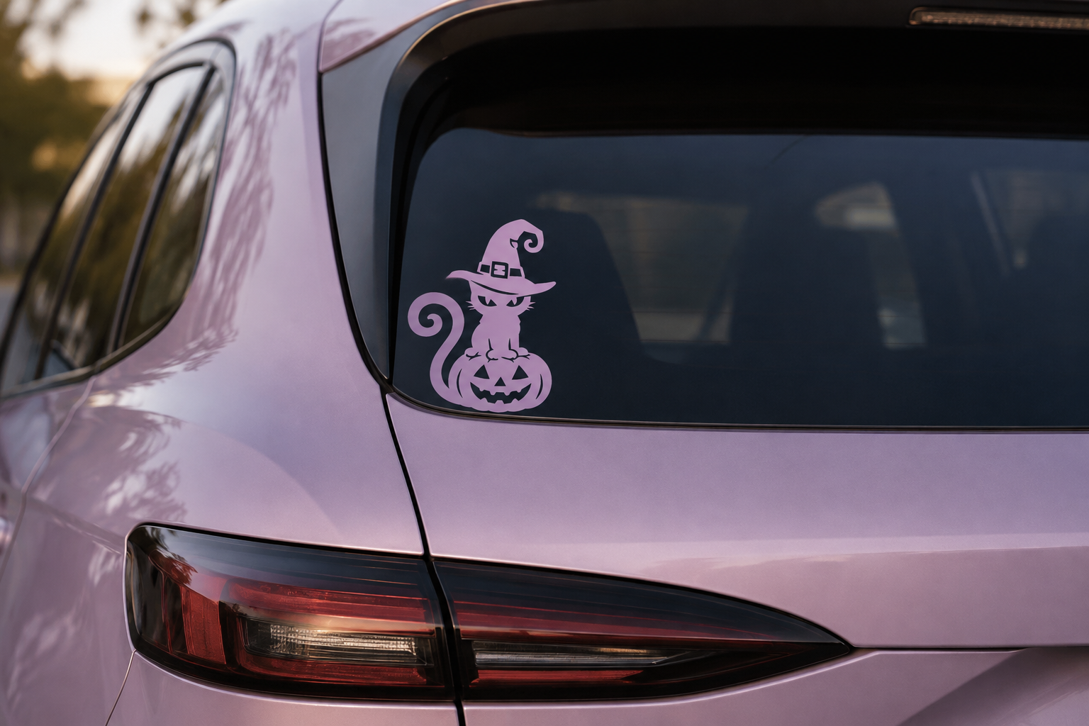 Lavender witch cat decal on a lavender hatchback window