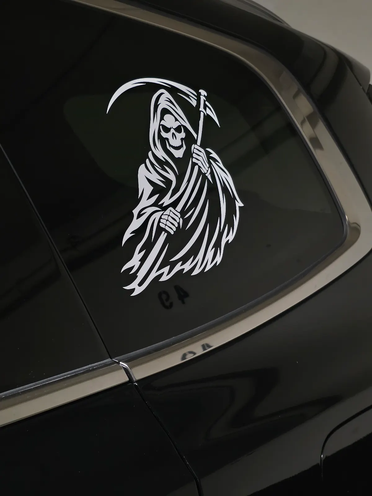 Closer view of the finished Grim Reaper decal showing the skull, scythe and clean cut details