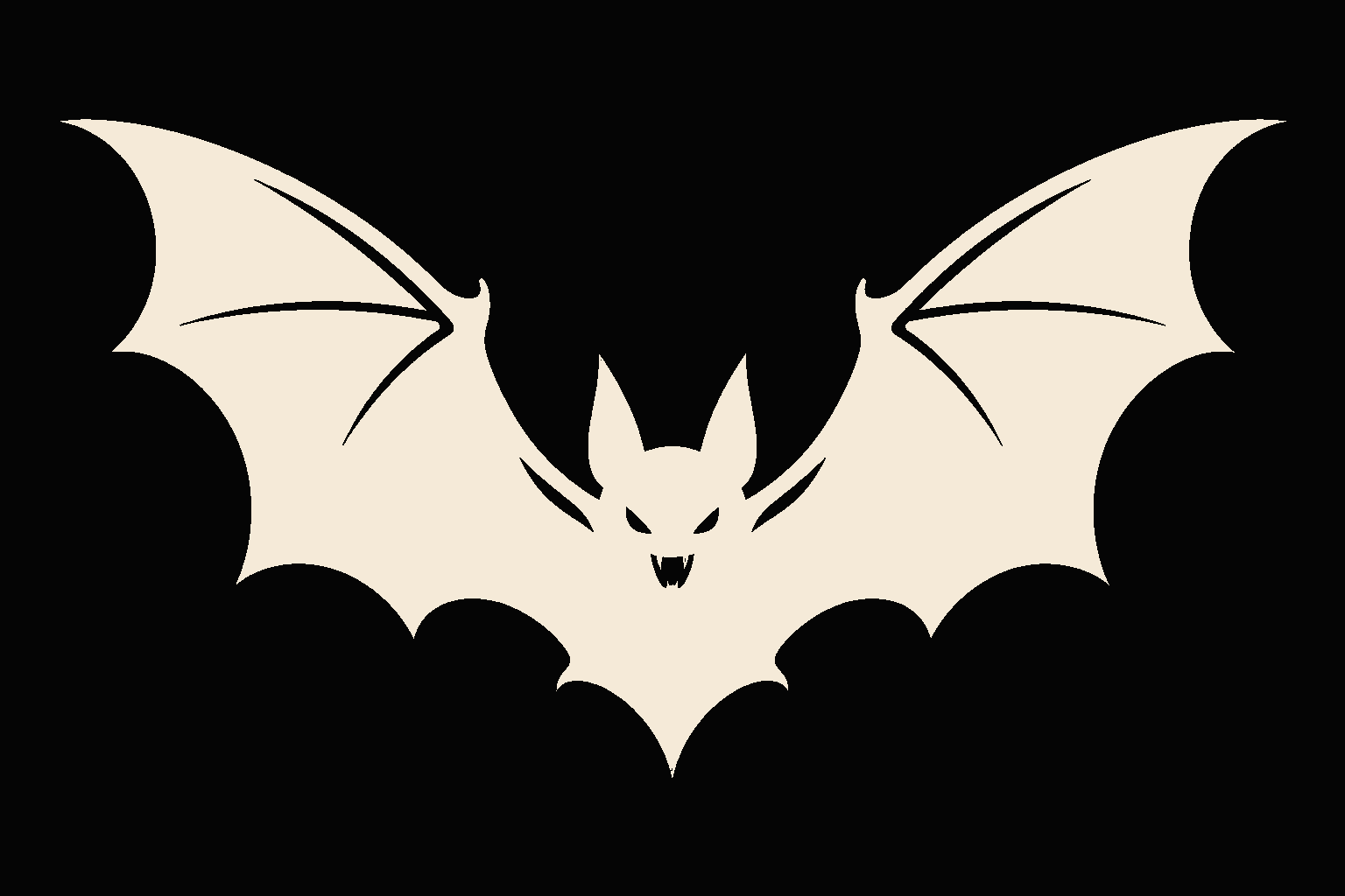 A bold vampire bat silhouette on a dark vehicle window